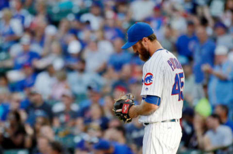 CHICAGO, IL – SEPTEMBER 17: Spencer Patton #45 of the Chicago Cubs reacts after giving up a grand slam to Chris Carter #33 of the Milwaukee Brewers (not pictured) during the ninth inning at Wrigley Field on September 17, 2016 in Chicago, Illinois. (Photo by Jon Durr/Getty Images) SF Giants