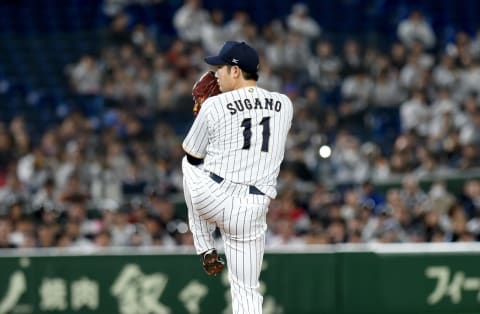 Japan’s Tomoyuki Sugano pitches the ball in the top of the first inning during the World Baseball Classic Pool E second round match between Cuba and Japan at Tokyo Dome in Tokyo on March 14, 2017. (TORU YAMANAKA/AFP via Getty Images)