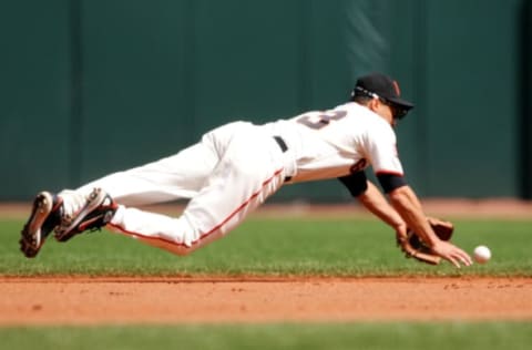 SAN FRANCISCO – APRIL 08: Omar Vizquel #13 of the San Francisco Giants dives for a ball hit by Nomar Garciaparra of the Los Angeles Dodgers during a Major League Baseball game on April 8, 2007 at AT&T Park in San Francisco, California. (Photo by Jed Jacobsohn/Getty Images)