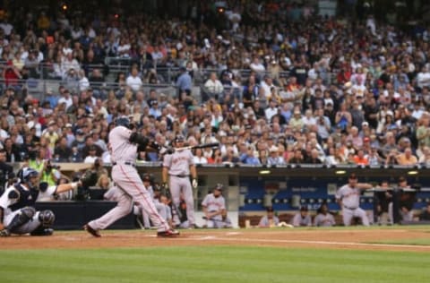 SAN DIEGO – AUGUST 4: Barry Bonds #25 of the San Francisco Giants hits career home run #755 in the second inning against the San Diego Padres during a MLB game at Petco Park August 4, 2007 in San Diego, California. Bonds tied Hank Aaron‘s career all time home run record. (Photo by Jed Jacobsohn/Getty Images)