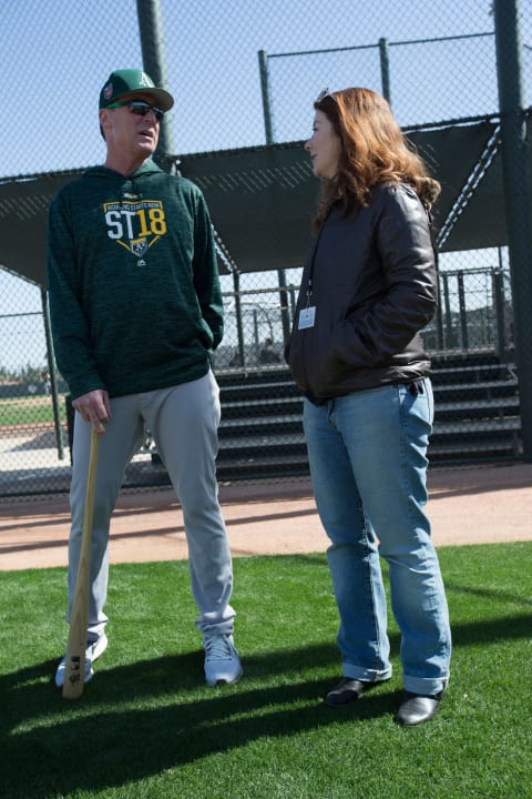 MESA, AZ – FEBRUARY 20: Manager Bob Melvin #6 of the Oakland Athletics talks with Susan Slusser of the San Francisco Chronicle during a spring training workout at Fitch Park on February 20, 2018. Slusser became the SF Giants beat writer earlier this week. (Photo by Michael Zagaris/Oakland Athletics/Getty Images) *** Local Caption *** Bob Melvin;