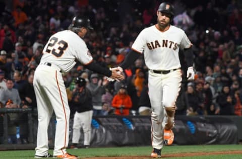 SAN FRANCISCO, CA – APRIL 24: Mac Williamson #51 of the San Francisco Giants is congratulated by third base coach Ron Wotus #23 on his solo home run against the Washington Nationals in the bottom of the six inning at AT&T Park on April 24, 2018 in San Francisco, California. (Photo by Thearon W. Henderson/Getty Images)