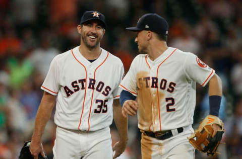 HOUSTON, TX – MAY 23: Justin Verlander #35 of the Houston Astros has words with Alex Bregman #2 after the third out of the inning against the San Francisco Giants at Minute Maid Park on May 23, 2018 in Houston, Texas. (Photo by Bob Levey/Getty Images)