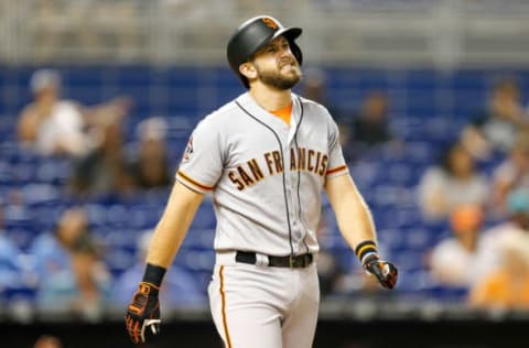 MIAMI, FL – JUNE 14: Evan Longoria #10 of the San Francisco Giants reacts after being hit by a pitch in the third inning against the Miami Marlins at Marlins Park on June 14, 2018 in Miami, Florida. (Photo by Michael Reaves/Getty Images)