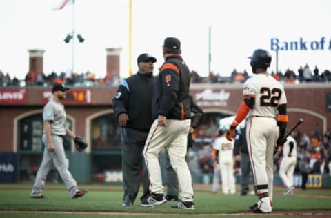 SAN FRANCISCO, CA – JUNE 19: Manager Bruce Bochy of the San Francisco Giants argues with umpire Laz Diaz after Dan Straily #58 of the Miami Marlins hit Buster Posey #28 of the San Francisco Giants in the second inning at AT&T Park on June 19, 2018 in San Francisco, California. (Photo by Ezra Shaw/Getty Images)