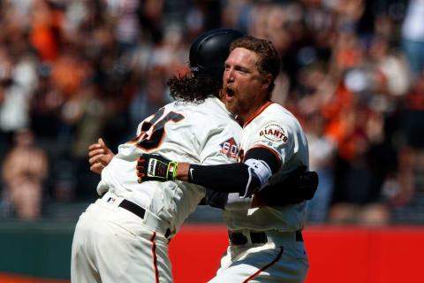 SAN FRANCISCO, CA – JUNE 24: Hunter Pence #8 of the San Francisco Giants is congratulated by Brandon Crawford #35 after hitting a two run walk off double against the San Diego Padres during the eleventh inning at AT&T Park on June 24, 2018 in San Francisco, California. The San Francisco Giants defeated the San Diego Padres 3-2 in 11 innings. (Photo by Jason O. Watson/Getty Images)