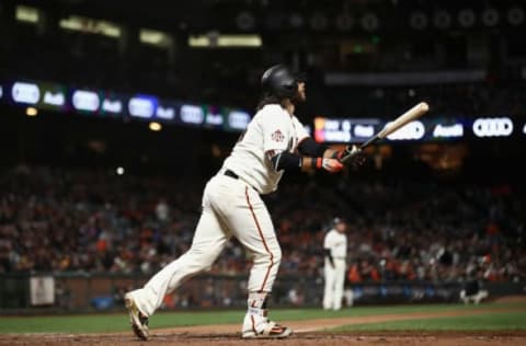 SAN FRANCISCO, CA – JUNE 27: Brandon Crawford #35 of the San Francisco Giants hits a walk off home run in the ninth inning to beat the Colorado Rockies at AT&T Park on June 27, 2018 in San Francisco, California. (Photo by Ezra Shaw/Getty Images)