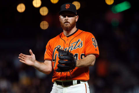 SAN FRANCISCO, CA – JULY 13: Sam Dyson #49 of the San Francisco Giants celebrates after the game against the Oakland Athletics at AT&T Park on July 13, 2018 in San Francisco, California. The San Francisco Giants defeated the Oakland Athletics 7-1. (Photo by Jason O. Watson/Getty Images)