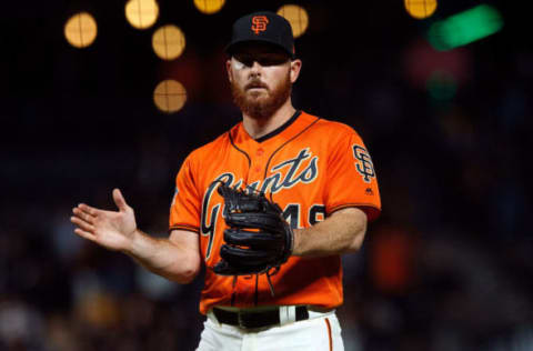 SAN FRANCISCO, CA – JULY 13: Sam Dyson #49 of the San Francisco Giants celebrates after the game against the Oakland Athletics at AT&T Park on July 13, 2018 in San Francisco, California. The San Francisco Giants defeated the Oakland Athletics 7-1. (Photo by Jason O. Watson/Getty Images)