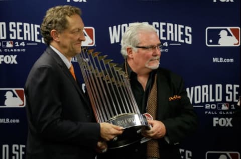 KANSAS CITY, MO – OCTOBER 29: San Francisco Giants general manager Brian Sabean holds The Commissioner’s Trophy after defeating the Kansas City Royals 3-2 in Game Seven of the 2014 World Series at Kauffman Stadium on October 29, 2014 in Kansas City, Missouri. (Photo by Pool/Getty Images)