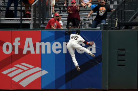 SAN FRANCISCO, CA – SEPTEMBER 03: Gorkys Hernandez #66 of the San Francisco Giants leaps at the wall to rob a home run away from Tommy Pham #28 of the St. Louis Cardinals in the top of the first inning at AT&T Park on September 3, 2017 in San Francisco, California. (Photo by Thearon W. Henderson/Getty Images)