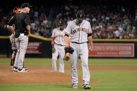 PHOENIX, AZ – SEPTEMBER 26: Matt Moore #45 of the SF Giants is relieved by Bruce Bochy #15 in the second inning of the MLB game against the Arizona Diamondbacks at Chase Field on September 26, 2017, in Phoenix, Arizona. (Photo by Jennifer Stewart/Getty Images)