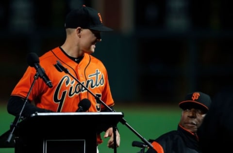 SAN FRANCISCO, CA – SEPTEMBER 29: Nick Hundley #5 of the San Francisco Giants is presented with the 2017 Willie Mac Award by Hall of Fame first baseman Willie McCovey before the game against the San Diego Padres at AT&T Park on September 29, 2017 in San Francisco, California. (Photo by Jason O. Watson/Getty Images)