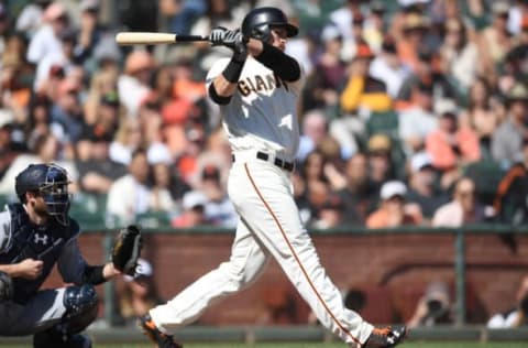 SAN FRANCISCO, CA – OCTOBER 01: Jarrett Parker #6 of the San Francisco Giants hits an rbi single scoring Buster Posey #28 against the San Diego Padres in the bottom of the fourth inning at AT&T Park on October 1, 2017 in San Francisco, California. (Photo by Thearon W. Henderson/Getty Images)