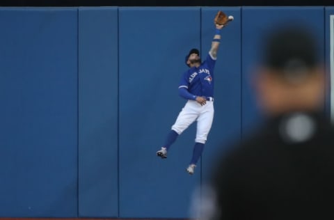 TORONTO, ON – SEPTEMBER 23: Kevin Pillar #11 of the Toronto Blue Jays cannot catch a double by Gary Sanchez #24 of the New York Yankees in the ninth inning during MLB game action at Rogers Centre on September 23, 2017 in Toronto, Canada. (Photo by Tom Szczerbowski/Getty Images)