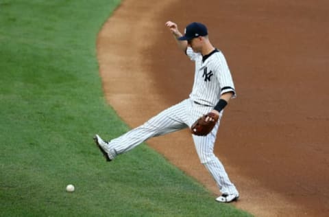 NEW YORK, NY – OCTOBER 18: Todd Frazier #29 of the New York Yankees reacts after an error during the first inning against the Houston Astros in Game Five of the American League Championship Series at Yankee Stadium on October 18, 2017 in the Bronx borough of New York City. (Photo by Mike Stobe/Getty Images)