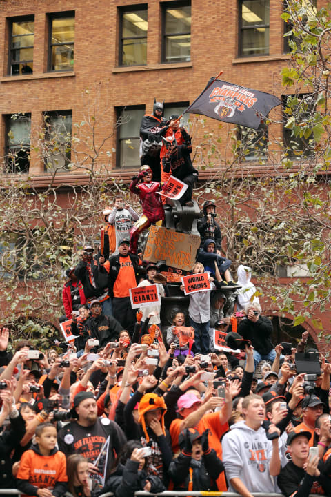 SAN FRANCISCO, CA – OCTOBER 31: Hundreds of thousands of fans lined Market Street and watched from buildings as the San Francisco Giants celebrated their World Series victory with a parade on October 31, 2012 in San Francisco, California. The San Francisco Giants beat the Detroit Tigers to win the 2012 World Series. (Photo by Ezra Shaw/Getty Images)