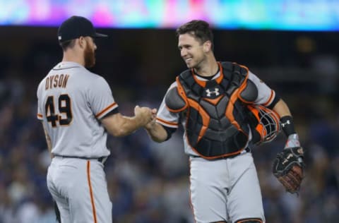 LOS ANGELES, CA – SEPTEMBER 23: Reliever Sam Dyson #49 and catcher Buster Posey #28 of the San Francisco Giants celebrate after Dyson pitched the ninth inning to pick up the save against the Los Angeles Dodgers at Dodger Stadium on September 23, 2017 in Los Angeles, California. The Giants won 2-1. (Photo by Stephen Dunn/Getty Images)