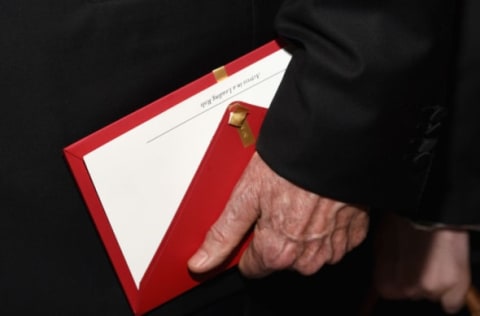 HOLLYWOOD, CA – FEBRUARY 26: Actor/filmmaker Warren Beatty holds the envelope containing the wrong award announcement for Best Picture during the 89th Annual Academy Awards Governors Ball at Hollywood