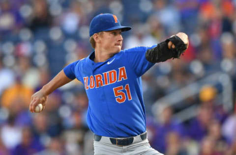 Omaha, NE – JUNE 26: Pitcher Brady Singer #51 of the Florida Gators delivers a pitch against the LSU Tigers in the first inning during game one of the College World Series Championship Series on June 26, 2017 at TD Ameritrade Park in Omaha, Nebraska. (Photo by Peter Aiken/Getty Images)