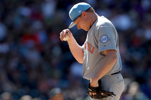 DENVER, CO – JUNE 18: Pitcher Mark Melancon #41 of the San Francisco Giants adjusts his cap in the ninth inning against the Colorado Rockies at Coors Field on June 18, 2017 in Denver, Colorado. (Photo by Matthew Stockman/Getty Images)