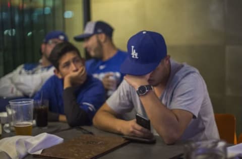 LOS ANGELES, CA – NOVEMBER 01: Los Angeles Dodgers fans react as the Houston Astros dominate the Los Angeles Dodgers in the final game of the World Series to take the championship on November 1, 2017 in Los Angeles, California. The battle between the Dodgers and Astros lasted till game seven of the best of seven series. (Photo by David McNew/Getty Images)