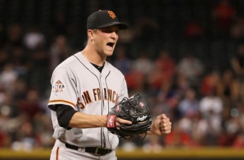 PHOENIX, AZ – APRIL 18: Relief pitcher Tony Watson #56 of the San Francisco Giants reacts after a double play during the eighth inning of the MLB game against the Arizona Diamondbacks at Chase Field on April 18, 2018 in Phoenix, Arizona. (Photo by Christian Petersen/Getty Images)