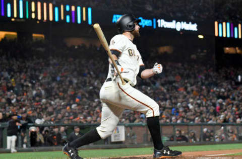 SAN FRANCISCO, CA – APRIL 24: Brandon Belt #9 of the San Francisco Giants hits a two-run home run against the Washington Nationals in the bottom of the third inning at AT&T Park on April 24, 2018 in San Francisco, California. (Photo by Thearon W. Henderson/Getty Images)