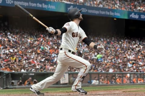 SAN FRANCISCO, CA – JULY 29: Steven Duggar #6 of the San Francisco Giants hits a sacrifice fly scoring Pablo Sandoval #48 against the Milwaukee Brewers in the bottom of the fifth inning at AT&T Park on July 29, 2018 in San Francisco, California. (Photo by Thearon W. Henderson/Getty Images)