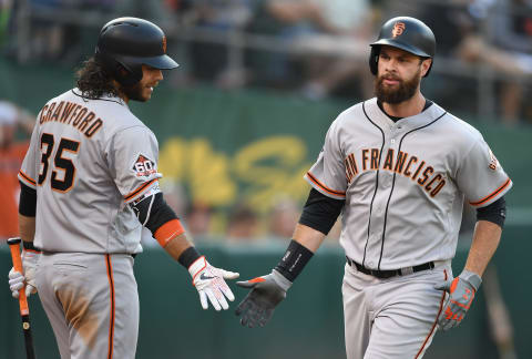 SF Giants shortstop Brandon Crawford (left) and first baseman Brandon Belt (right). (Photo by Thearon W. Henderson/Getty Images)