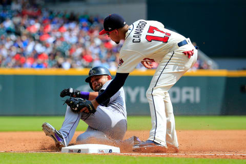 ATLANTA, GA – AUGUST 19: Gerardo Parra #8 of the Colorado Rockies is tagged out by Johan Camargo #17 of the Atlanta Braves during the ninth inning at SunTrust Park on August 19, 2018 in Atlanta, Georgia. (Photo by Daniel Shirey/Getty Images)