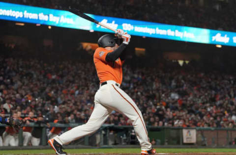 SAN FRANCISCO, CA – AUGUST 31: Chris Shaw #26 of the San Francisco Giants in his major league debut hits a sacrifice fly scoring Brandon Belt #9 in the bottom of the seventh inning at AT&T Park on August 31, 2018 in San Francisco, California. (Photo by Thearon W. Henderson/Getty Images)