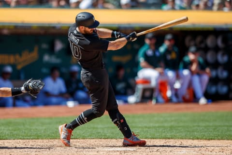 OAKLAND, CA – AUGUST 25: Evan Longoria #10 of the San Francisco Giants hits an RBI single against the Oakland Athletics during the seventh inning at the RingCentral Coliseum on August 25, 2019 in Oakland, California. The San Francisco Giants defeated the Oakland Athletics 5-4. Teams are wearing special color schemed uniforms with players choosing nicknames to display for Players’ Weekend. (Photo by Jason O. Watson/Getty Images)