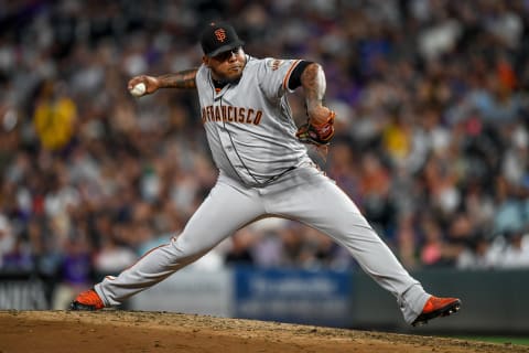 SF Giants RHP Reyes Moronta pitches against the Colorado Rockies at Coors Field on July 15, 2019. (Photo by Dustin Bradford/Getty Images)