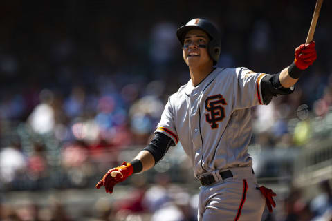 Mauricio Dubón #19 of the SF Giants watches a fly ball during the fifth inning of the game against the Atlanta Braves at SunTrust Park on September 22, 2019, in Atlanta, Georgia. (Photo by Carmen Mandato/Getty Images)