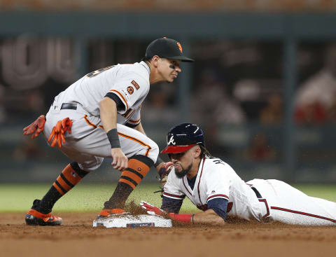 ATLANTA, GEORGIA – SEPTEMBER 21: Centerfielder Billy Hamilton #9 of the Atlanta Braves slides into second base under the tag of shortstop Mauricio Dubon #19 of the San Francisco Giants after hitting an RBI double in the second inning during the game at SunTrust Park on September 21, 2019 in Atlanta, Georgia. (Photo by Mike Zarrilli/Getty Images)