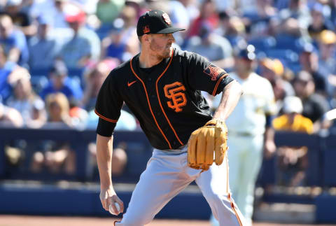 How the SF Giants should handle right-handed pitcher Kevin Gausman’s free agency is one of many topics discussed this week on Sound the Foghorn. (Photo by Norm Hall/Getty Images).