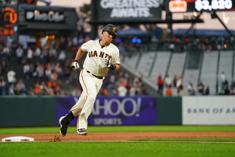 Buster Posey #28 of the SF Giants rounds third base. (Photo by Daniel Shirey/Getty Images)