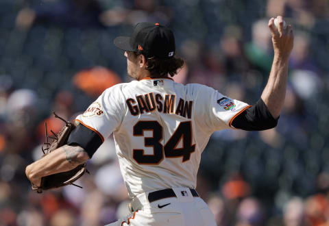 SAN FRANCISCO, CALIFORNIA – JUNE 05: Kevin Gausman #34 of the SF Giants pitches against the Chicago Cubs during the top of the first inning at Oracle Park on June 05, 2021 in San Francisco, California. The Giants are wearing logos with rainbow colors on their hats and right sleeve that symbolize the LGBT community on San Francisco Pride Day. (Photo by Thearon W. Henderson/Getty Images)