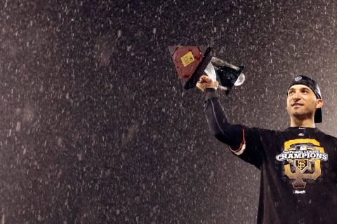 SAN FRANCISCO, CA – OCTOBER 22: Marco Scutaro #19 of the San Francisco Giants holds up the MVP trophy after the Giants defeat the St. Louis Cardinals 9-0 in Game Seven of the National League Championship Series at AT&T Park on October 22, 2012 in San Francisco, California. (Photo by David J. Phillip/Pool/Getty Images)