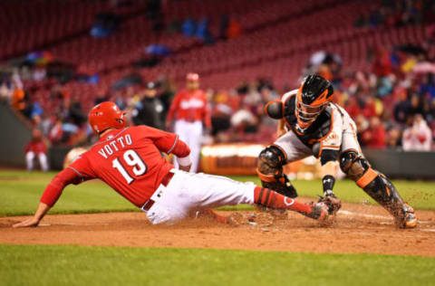 CINCINNATI, OH – MAY 5: Catcher Buster Posey #28 of the San Francisco Giants tags out Joey Votto #19 of the Cincinnati Reds at home plate in the second inning after Votto tried to score from second base at Great American Ball Park on May 5, 2017 in Cincinnati, Ohio. (Photo by Jamie Sabau/Getty Images)