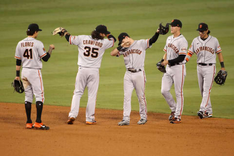 The SF Giants celebrate their win over the Los Angeles Dodgers. (Photo by Katelyn Mulcahy/Getty Images)