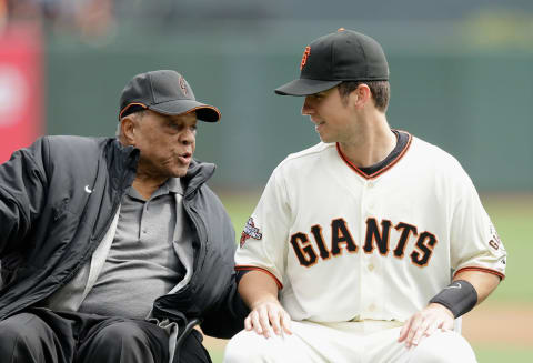 SAN FRANCISCO, CA – APRIL 06: Buster Posey #28 of the SF Giants talks to Willie Mays during a ceremony honoring Posey for winning the 2012 National League MVP before the Giants game against the St. Louis Cardinals at AT&T Park on April 6, 2013. (Photo by Ezra Shaw/Getty Images)