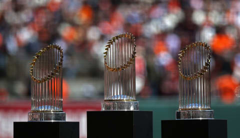 San Francisco Giants World Series trophies from 2010, 2012, and 2014 (Photo by Brad Mangin/MLB Photos via Getty Images)