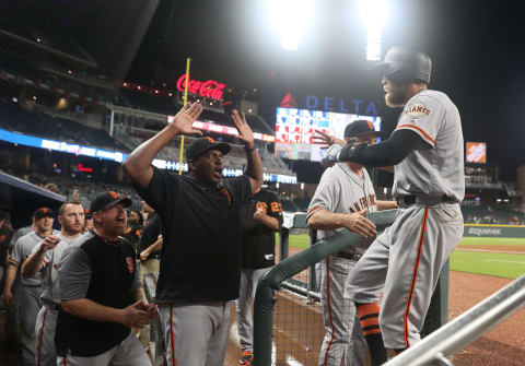 SF Giants right fielder Hunter Pence (8) celebrates his solo home run with then Giants hitting coach Hensley Meulens (31, center). (Jason Getz-USA TODAY Sports)