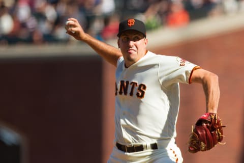 Former SF Giants pitcher Derek Law (64) will be trying to regain his early-career form with the Minnesota Twins. (Andrew Villa-USA TODAY Sports)