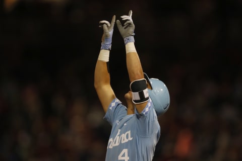 Jun 20, 2018; Omaha, NE, USA; North Carolina Tar Heels catcher Brandon Martorano (4) reacts after reaching third base against the Oregon State Beavers in the sixth inning in the College World Series at TD Ameritrade Park. (Bruce Thorson-USA TODAY Sports)