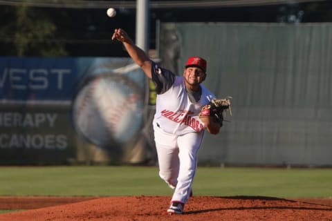 Salem-Keizer’s Kervin Castro pitches during the home opener against the Boise Hawks at Volcanoes Stadium on Friday, June 14.