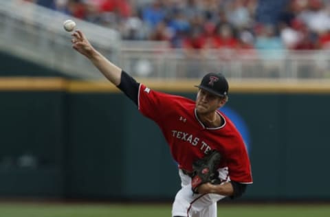 Texas Tech Red Raiders pitcher Caleb Kilian (32) throws in the first inning against the Arkansas Razorbacks in the 2019 College World Series at TD Ameritrade Park. He was drafted by the SF Giants in the 2019 Draft. (Bruce Thorson-USA TODAY Sports)