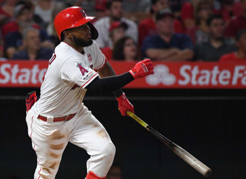 Los Angeles Angels infielder Luis Rengifo (4) hits an RBI double in the third inning of the game against the Boston Red Sox at Angel Stadium of Anaheim. (Jayne Kamin-Oncea-USA TODAY Sports)